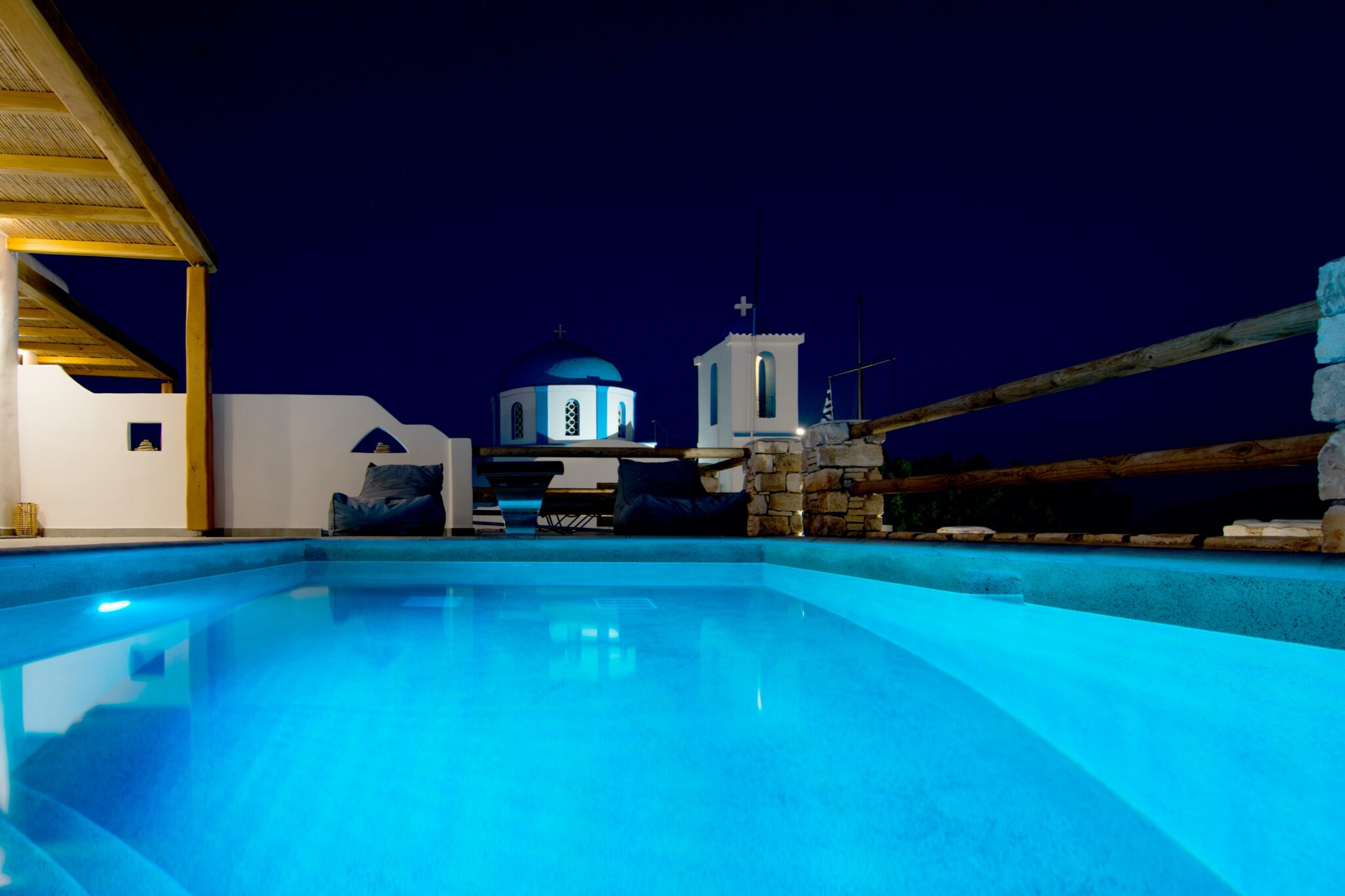 Private pool lit at night