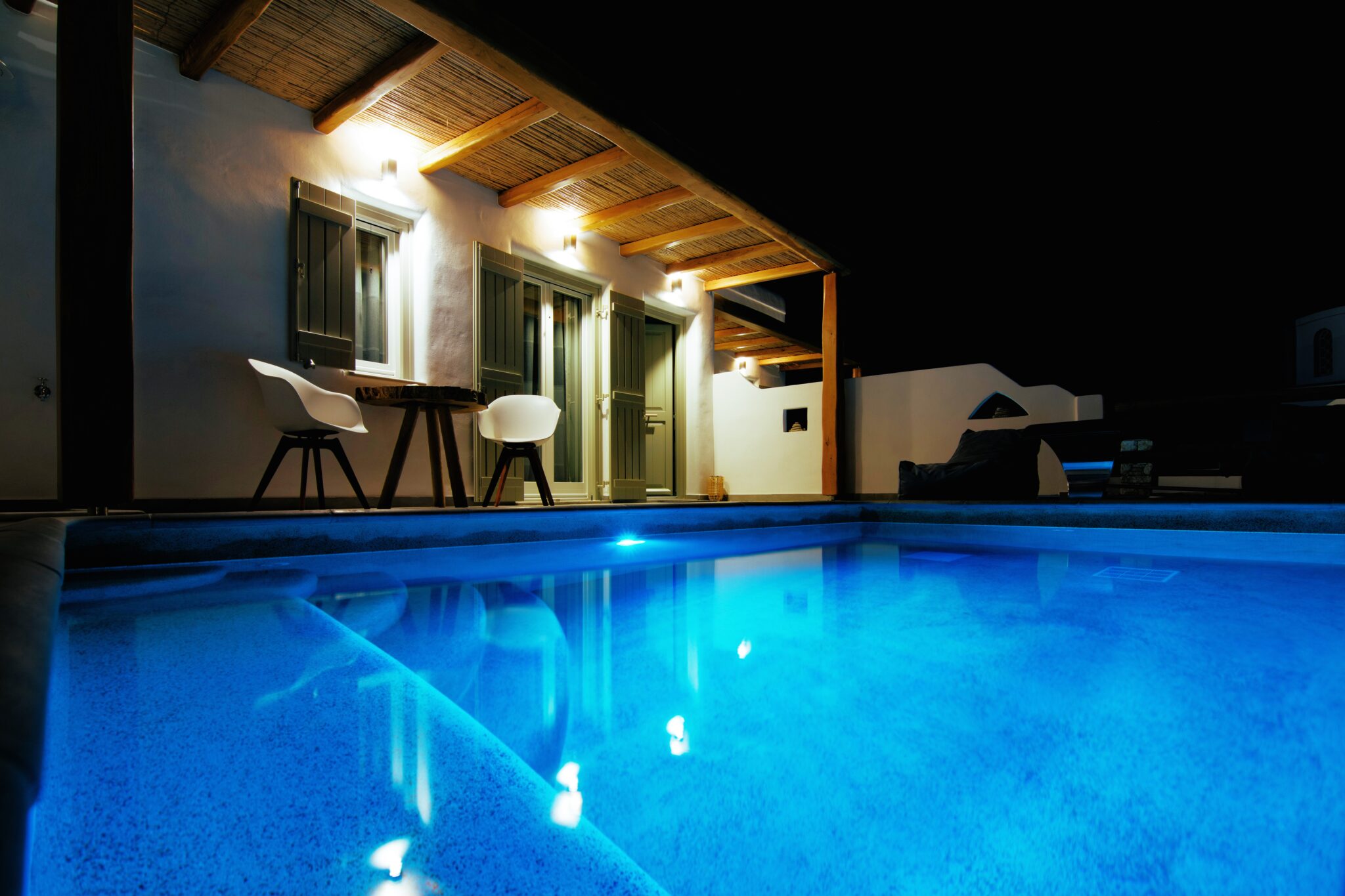 Suite with Private Pool at night – lit private pool and pergola, Koufonisia